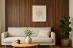Modern living room with a beige sofa, wooden coffee table, and decorative wood effect wall panel